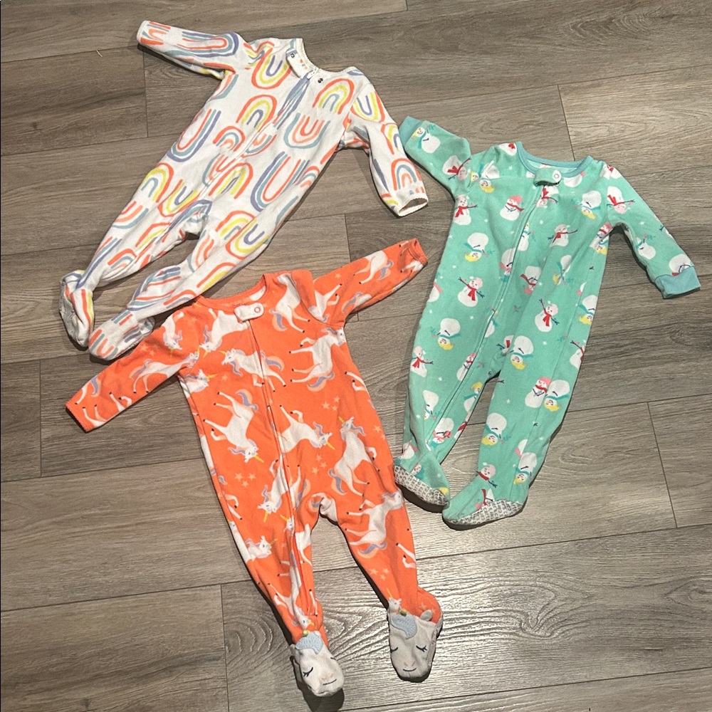 Carter’s Unicorn and Rainbow and Snowman Kids Footed Pajama Set of 3